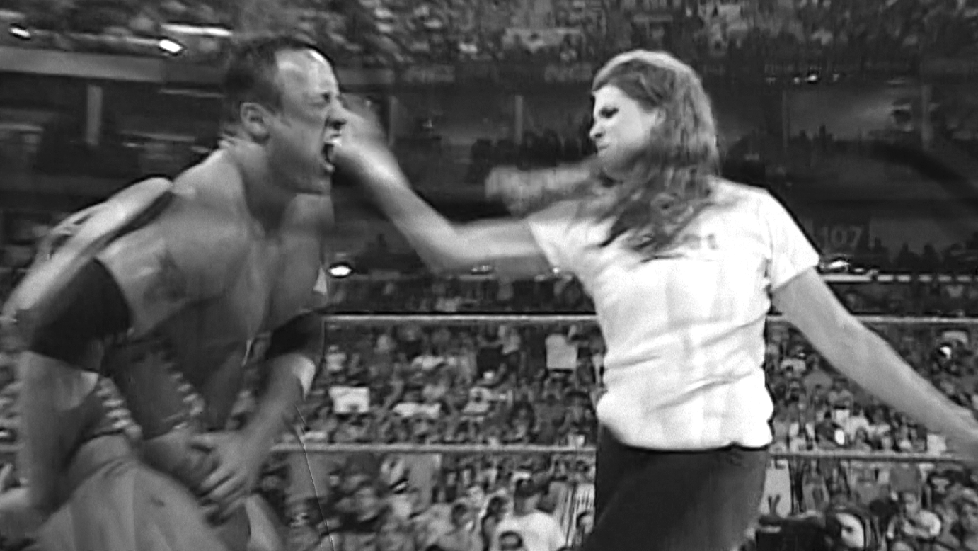 Lita & The Rock vs. Kurt Angle & Stephanie McMahon