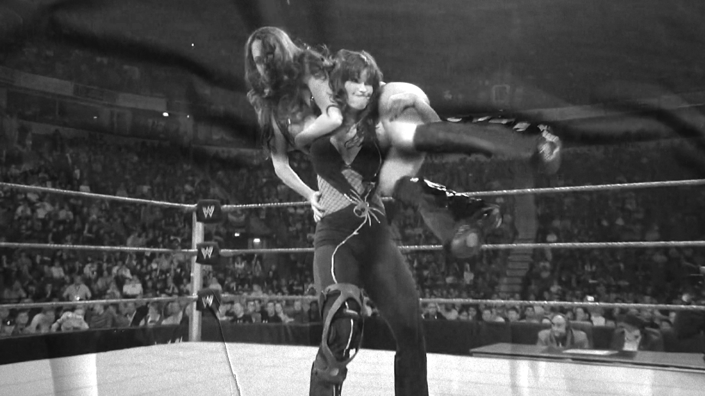 Brie Bella & Nikki Bella vs. Natalya & Victoria