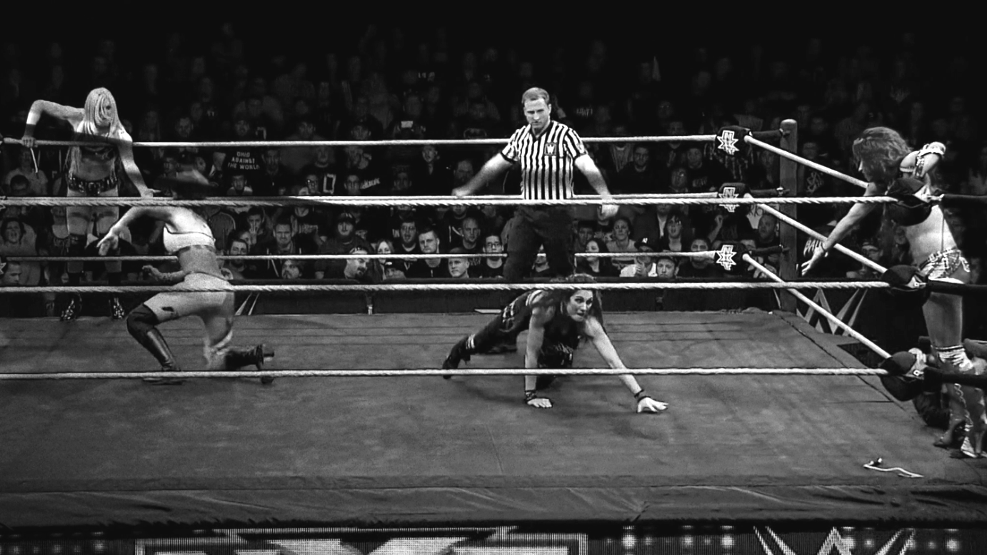Sasha Banks & Becky Lynch vs. Bayley & Charlotte Flair