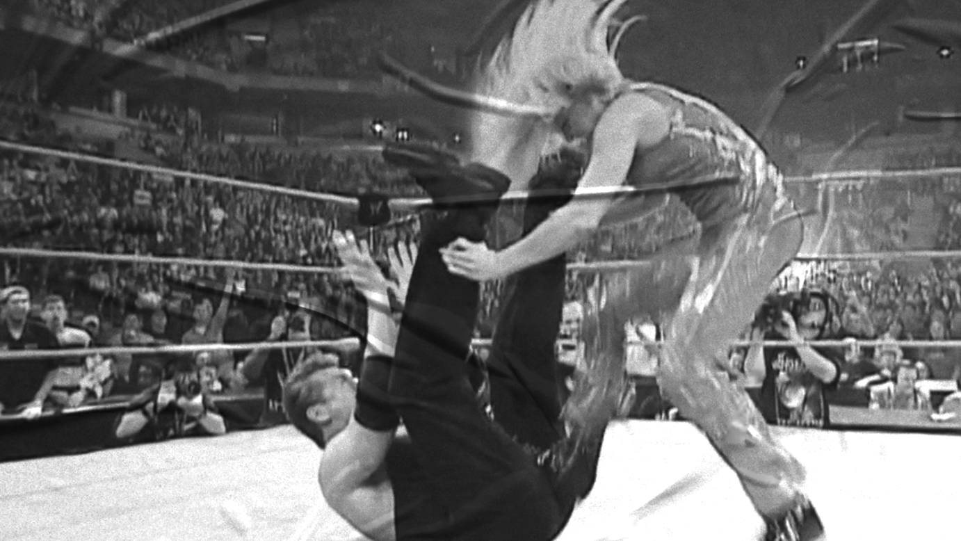 The Rock & Trish Stratus vs. Kurt Angle & Vince McMahon